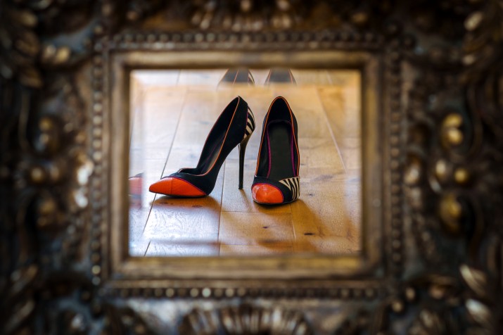 beautiful stiletto shoes in ornate mirror